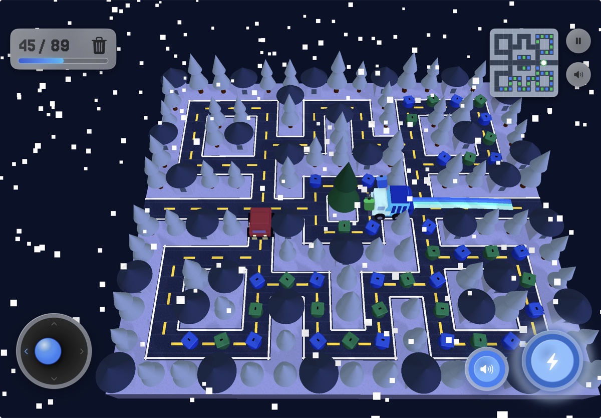 A blue garbage truck using its boost through a snowy route